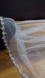 Voile de mariée en pierres