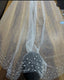 Voile de mariée en perles et cristaux